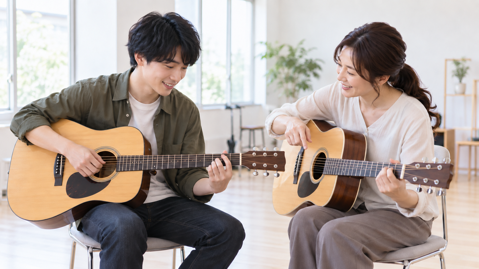 ギターの基礎を学ぶ男性と女性講師のイメージ